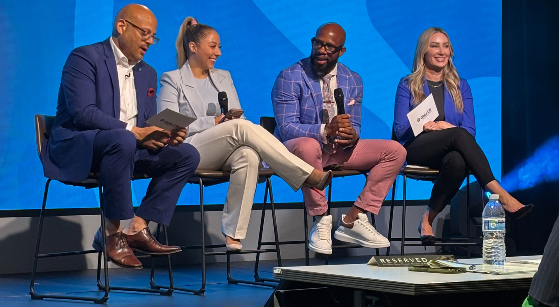 Leaders on stage at a Globe Life convention